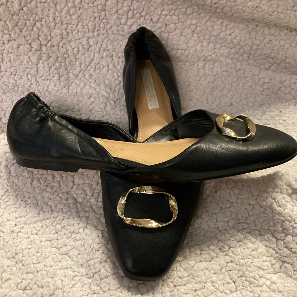 Black platform shoes.